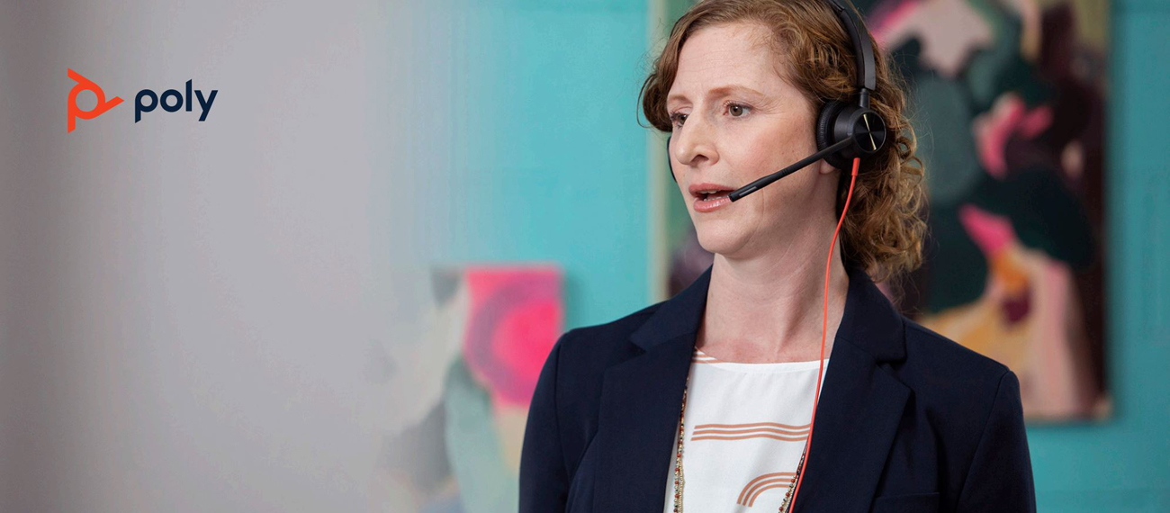 A woman is having a Poly Blackwire 3325 Microsoft USB-C Headset on